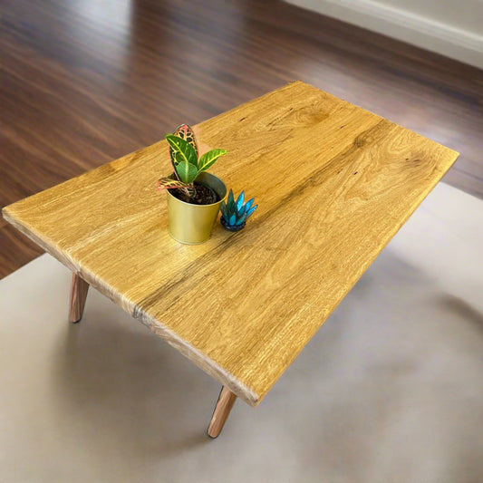 mid centry modern style coffee table with red gum wood base and white limba top