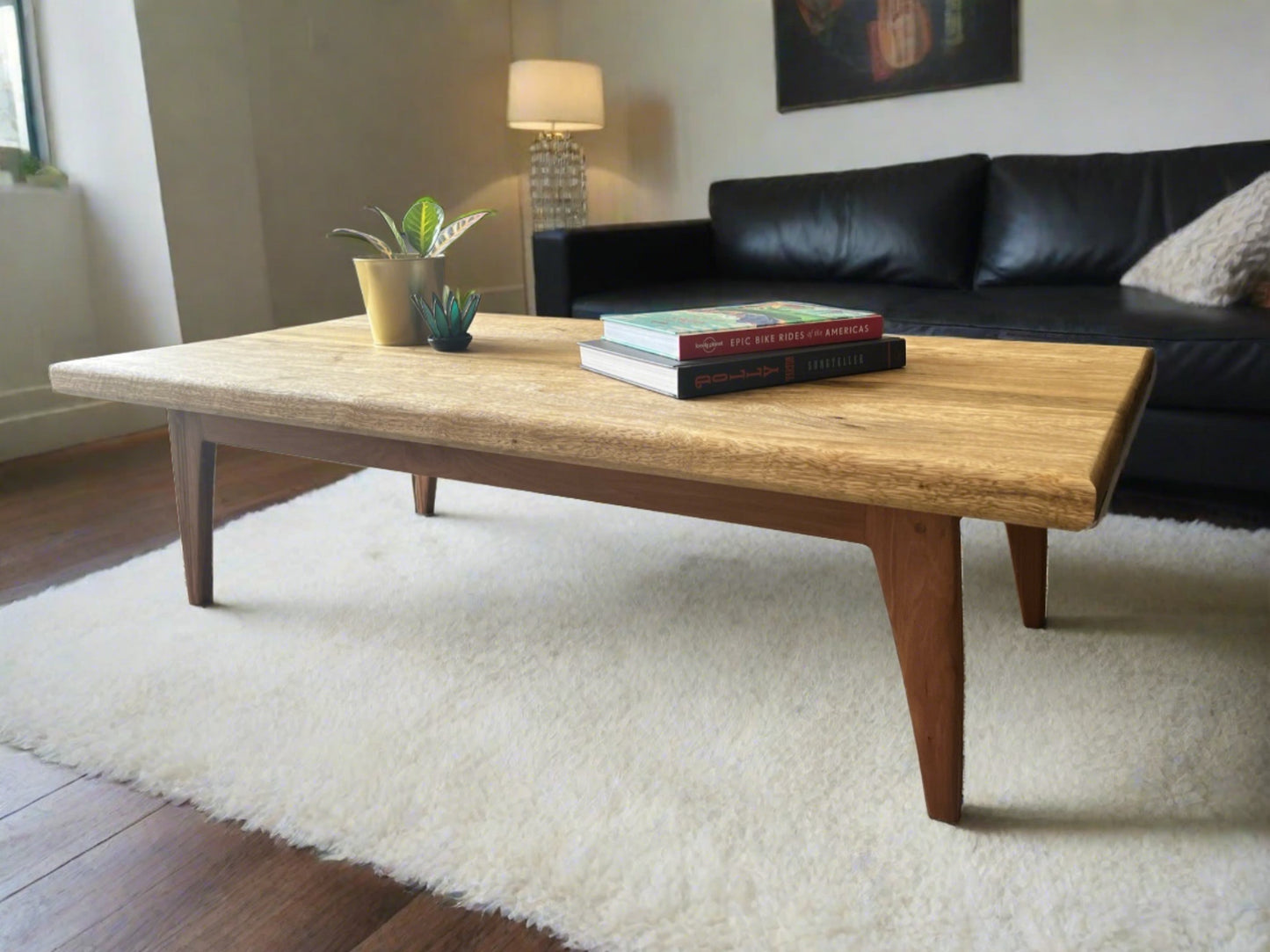 mid centry modern style coffee table with red gum wood base and white limba top