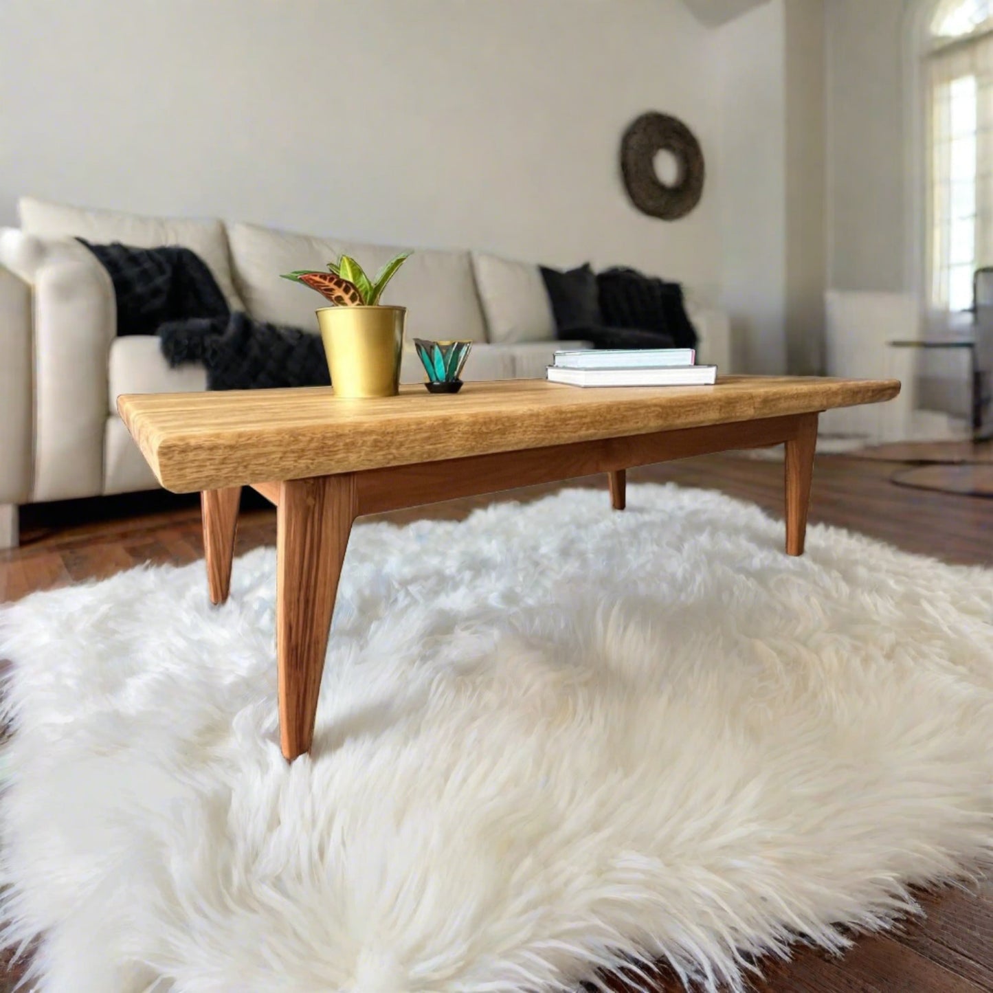 mid centry modern style coffee table with red gum wood base and white limba top